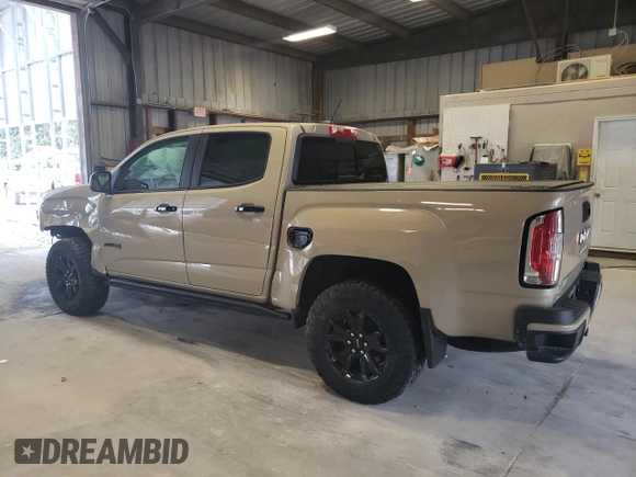 2022 GMC Canyon 4WD AT4 w/Cloth with VIN 1GTG6FEN2N1152450, listed as a Copart auction lot 71247114 with 34,007 mi miles and Salvage Title. Bid and sale history available at carsss.com. Image 2.