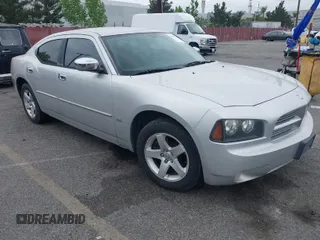 2010 Dodge Charger SXT with VIN 2B3CA3CVXAH307483, listed as a IAAI auction lot 42005739 with 165,844 mi miles. Bid and sale history available at carsss.com. Image 1.