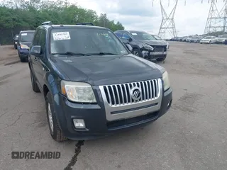 2009 Mercury Mariner Premier z VIN 4M2CU87719KJ13048, wystawiony jako IAAI lot #42181702 z przebiegiem 138 094 mil mil oraz . Historia ofert i sprzedaży dostępna na DreamBid. Obrazek 12.