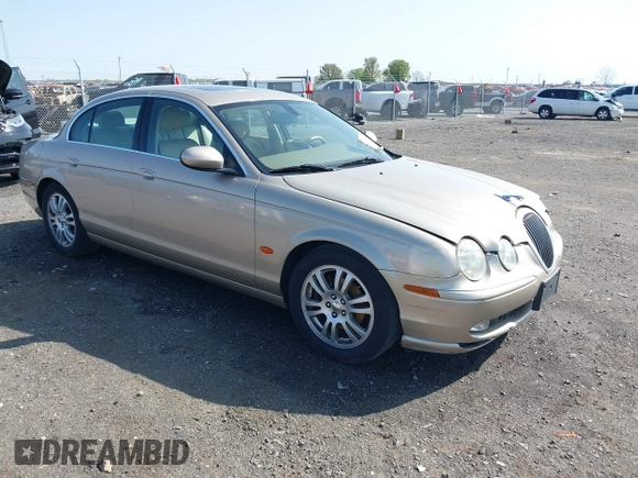 2005 Jaguar S-Type with VIN SAJWA01T95FN22745, listed as a IAAI auction lot 41898269 with 57,614 mi miles and . Bid and sale history available at DreamBid. Image 1.