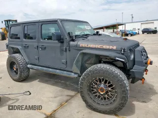 2021 Jeep Wrangler Unlimited Rubicon with VIN 1C4HJXFG5MW542260, listed as a Copart auction lot 59476655 with 19,870 mi miles and Salvage title. Bid and sale history available at DreamBid. Image 4.