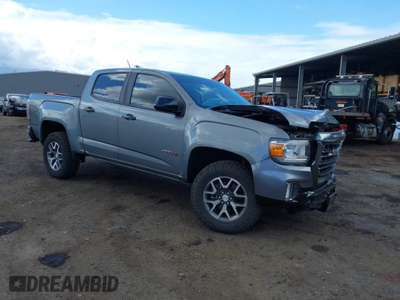 2021 GMC Canyon 4WD AT4 z VIN 1GTG6FEN8M1275345, wystawiony jako IAAI lot #42045878 z przebiegiem 68 299 mil mil oraz . Historia ofert i sprzedaży dostępna na DreamBid. Obrazek 1.