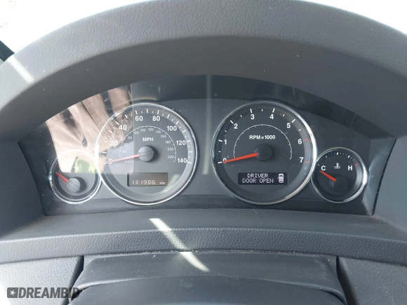 2010 Jeep Grand Cherokee Laredo with VIN 1J4PR4GK2AC104857, listed as a IAAI auction lot 42009569 with 131,986 mi miles. Bid and sale history available at carsss.com. Image 7.