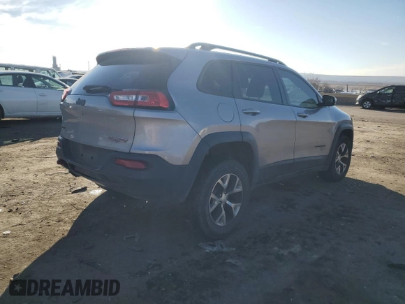 2018 Jeep Cherokee Trailhawk with VIN 1C4PJMBB9JD571773, listed as a Copart auction lot 82876514 with 137,565 mi miles and Salvage title. Bid and sale history available at DreamBid. Image 3.