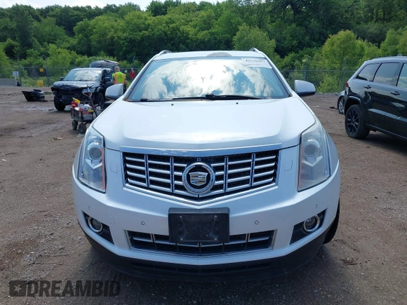 2013 Cadillac SRX Performance Collection with VIN 3GYFNHE3XDS520177, listed as a IAAI auction lot 42536457 with 217,963 mi miles and . Bid and sale history available at DreamBid. Image 12.