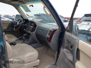 2002 Mitsubishi Montero Limited z VIN JA4MW51RX2J040586, wystawiony jako IAAI lot #41566077 z przebiegiem 149 851 mil mil oraz . Historia ofert i sprzedaży dostępna na DreamBid. Obrazek 5.