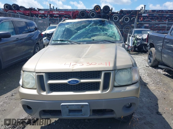 2003 Ford Explorer Sport Trac XLS z VIN 1FMZU77E23UC35868, wystawiony jako IAAI lot #42530211 z przebiegiem 223 483 mil mil oraz . Historia ofert i sprzedaży dostępna na DreamBid. Obrazek 12.
