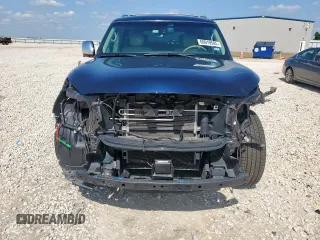 2015 Infiniti QX80 z VIN JN8AZ2NE5F9087834, wystawiony jako Copart lot #60919505 z przebiegiem 42 526 mil mil oraz Szkoda całkowita • Salvage title. Historia ofert i sprzedaży dostępna na DreamBid. Obrazek 5.