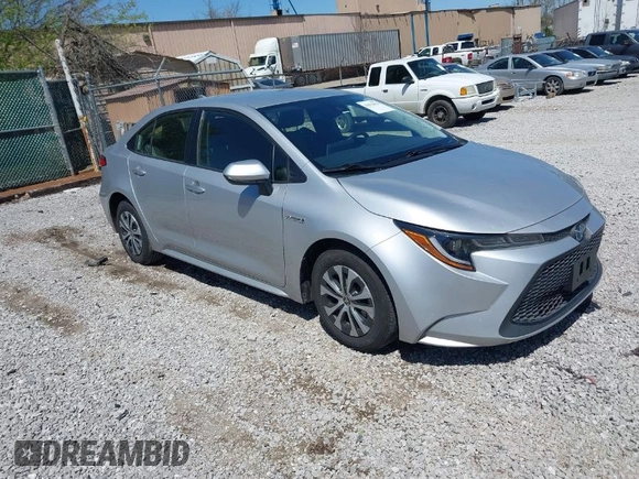 2021 Toyota Corolla Hybrid LE with VIN JTDEAMDE5MJ022110, listed as a IAAI auction lot 41912920 with 59,198 mi miles. Bid and sale history available at carsss.com. Image 1.