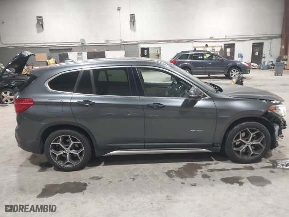 2016 BMW X1 xDrive28i with VIN WBXHT3C3XG5E47536, listed as a IAAI auction lot 41672144 with 97,932 mi miles. Bid and sale history available at carsss.com. Image 13.