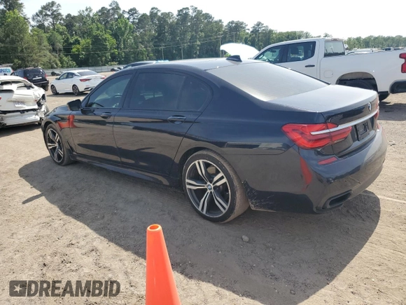 2016 BMW 7 Series 750i z VIN WBA7F0C57GGM20650, wystawiony jako Copart lot #57177555 z przebiegiem 113 632 mil mil oraz Czysty tytuł • Clean title. Historia ofert i sprzedaży dostępna na DreamBid. Obrazek 2.