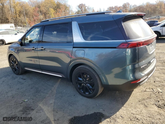 2023 Kia Carnival SX Prestige with VIN KNDNE5H33P6227354, listed as a Copart auction lot 79184054 with 33,602 mi miles and Salvage Title. Bid and sale history available at carsss.com. Image 2.