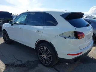 2017 Porsche Cayenne with VIN WP1AA2A23HKA80695, listed as a IAAI auction lot 41532359 with 71,628 mi miles. Bid and sale history available at carsss.com. Image 3.
