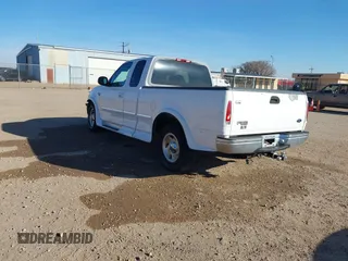 1998 Ford F-150 with VIN 1FTZX17W3WKB43668, listed as a IAAI auction lot 41243322 with 154,780 mi miles and . Bid and sale history available at DreamBid. Image 3.