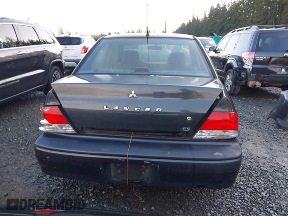 2003 Mitsubishi Lancer ES with VIN JA3AJ26E83U006060, listed as a IAAI auction lot 41254660 with 220,490 mi miles. Bid and sale history available at carsss.com. Image 16.