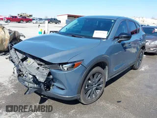 2021 Mazda CX-5 Touring with VIN JM3KFACM1M0317763, listed as a IAAI auction lot 41775712 with 75,068 mi miles. Bid and sale history available at carsss.com. Image 20.