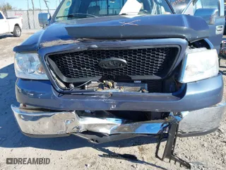 2004 Ford F-150 XLT with VIN 1FTRW12W44KD01717, listed as a IAAI auction lot 41252201 with 118,157 mi miles. Bid and sale history available at carsss.com. Image 6.