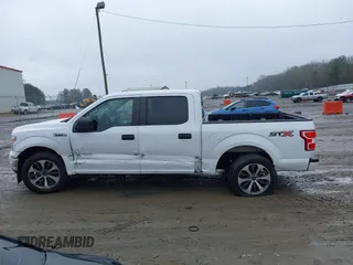 2019 Ford F-150 XL with VIN 1FTEW1CP0KKF10214, listed as a IAAI auction lot 41222565 with 76,920 mi miles and . Bid and sale history available at carsss.com. Image 14.