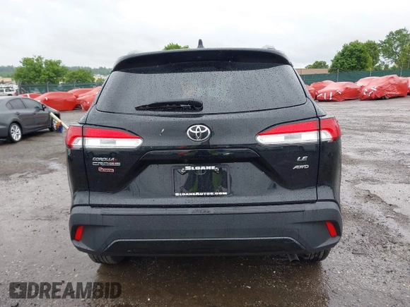 2022 Toyota Corolla Cross LE with VIN 7MUCAABG8NV004527, listed as a IAAI auction lot 42259519 with 15,211 mi miles and . Bid and sale history available at DreamBid. Image 15.