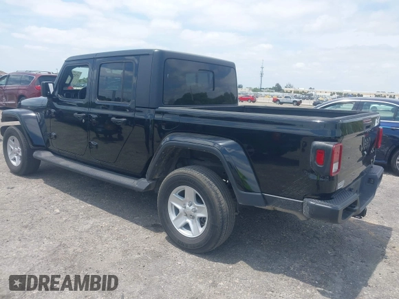2022 Jeep Gladiator Willys Sport z VIN 1C6HJTAG7NL161701, wystawiony jako IAAI lot #42097144 z przebiegiem 32 989 mil mil oraz . Historia ofert i sprzedaży dostępna na DreamBid. Obrazek 3.