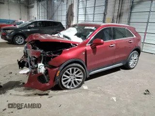 2019 Cadillac XT4 AWD Premium Luxury with VIN 1GYFZDR44KF114297, listed as a Copart auction lot 87750235 with 52,163 mi miles and Salvage Title. Bid and sale history available at carsss.com. Image 1.