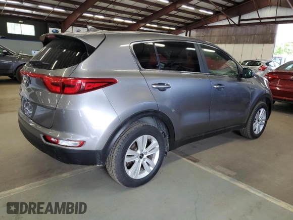 2018 Kia Sportage LX z VIN KNDPMCAC5J7426921, wystawiony jako Copart lot #57848805 z przebiegiem 128 089 mil mil oraz Czysty tytuł • Clean title. Historia ofert i sprzedaży dostępna na DreamBid. Obrazek 3.