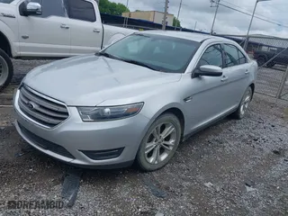 2014 Ford Taurus SEL with VIN 1FAHP2H8XEG161271, listed as a IAAI auction lot 42105228 with 140,256 mi miles. Bid and sale history available at carsss.com. Image 2.