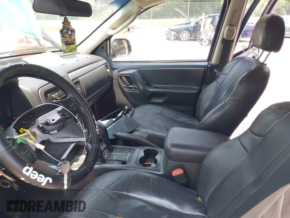 2004 Jeep Grand Cherokee with VIN 1J8GW48N94C135866, listed as a IAAI auction lot 42419888 with 326,880 mi miles and . Bid and sale history available at DreamBid. Image 5.