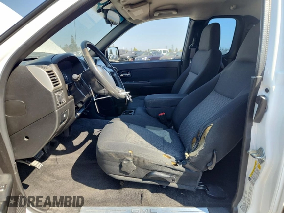 2008 GMC Canyon SLE1 with VIN 1GTCS19E088109552, listed as a Copart auction lot 65279225 with 191,816 mi miles and Salvage title. Bid and sale history available at DreamBid. Image 7.