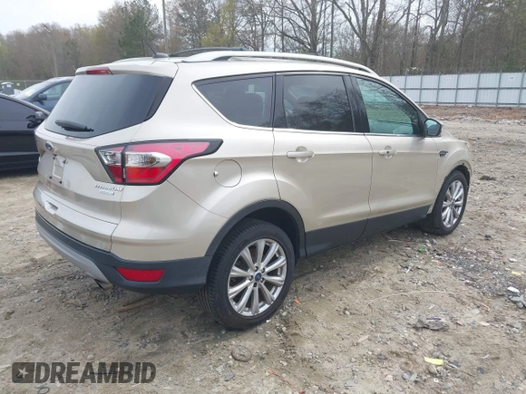 2017 Ford Escape Titanium with VIN 1FMCU0JD2HUC30884, listed as a IAAI auction lot 41801272 with 111,644 mi miles. Bid and sale history available at carsss.com. Image 4.