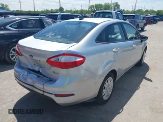 2014 Ford Fiesta S with VIN 3FADP4AJ9EM182707, listed as a IAAI auction lot 42264724 with 149,051 mi miles and . Bid and sale history available at DreamBid. Image 4.