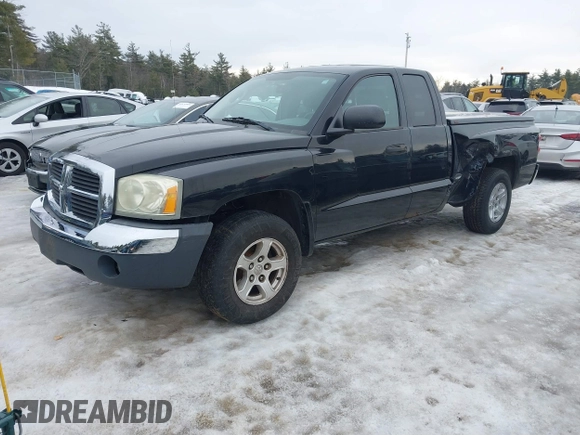 2005 Dodge Dakota SLT with VIN 1D7HE42K75S140168, listed as a IAAI auction lot 41581634 with 121,983 mi miles and . Bid and sale history available at carsss.com. Image 2.