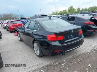 2012 BMW 3 Series 328i with VIN WBA3A5C59CF342687, listed as a IAAI auction lot 42116175 with 139,559 mi miles. Bid and sale history available at carsss.com. Image 3.