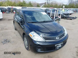2012 Nissan Versa S with VIN 3N1BC1CP9CK290446, listed as a IAAI auction lot 41861756 with 124,883 mi miles. Bid and sale history available at carsss.com. Image 1.