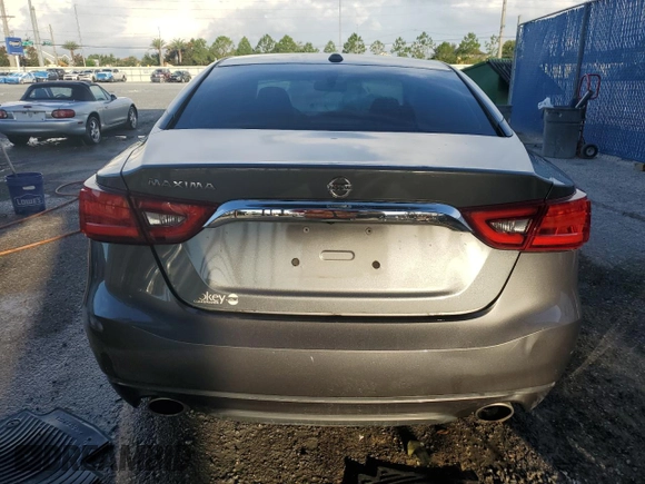2018 Nissan Maxima SV with VIN 1N4AA6AP0JC390247, listed as a Copart auction lot 61824725 with 64,078 mi miles and Salvage title. Bid and sale history available at DreamBid. Image 6.
