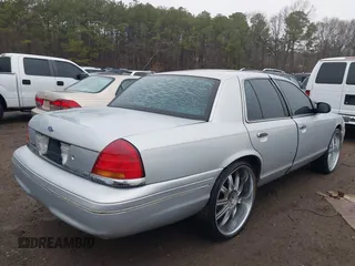 2001 Ford Crown Victoria LX с VIN 2FAFP74W21X143151, выставлен на аукционе IAAI как лот 41471923 с пробегом 207 583 миль миль и . История ставок и продаж доступна на DreamBid. Изображение 4.