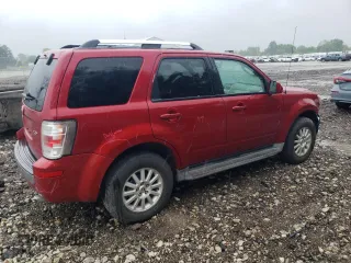 2010 Mercury Mariner Premier z VIN 4M2CN8H75AKJ13425, wystawiony jako Copart lot #57613855 z przebiegiem 90 437 mil mil oraz Szkoda całkowita • Salvage title. Historia ofert i sprzedaży dostępna na DreamBid. Obrazek 3.