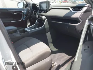 2022 Toyota RAV4 Hybrid XLE with VIN 2T3RWRFV9NW130472, listed as a IAAI auction lot 40990707 with 156,174 mi miles and . Bid and sale history available at DreamBid. Image 5.