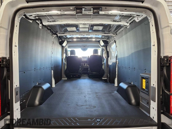 2025 Ford Transit with VIN 1FTBW1YM6SKA12973, listed as a IAAI auction lot 42756120 with 30 mi miles and . Bid and sale history available at DreamBid. Image 2.