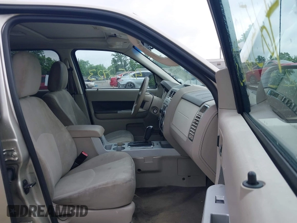 2010 Mercury Mariner with VIN 4M2CN8B73AKJ05123, listed as a IAAI auction lot 42512923 with 240,736 mi miles and . Bid and sale history available at DreamBid. Image 5.