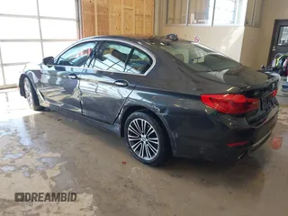 2018 BMW 5 Series 530i xDrive with VIN WBAJA7C55JWA73459, listed as a IAAI auction lot 41634921 with 64,759 mi miles and . Bid and sale history available at carsss.com. Image 3.