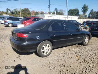 1996 Ford Contour z VIN 1FALP65L5TK212857, wystawiony jako Copart lot #76701614 z przebiegiem 74 994 mil mil oraz Szkody całkowita. Historia ofert i sprzedaży dostępna na DreamBid. Obrazek 3.
