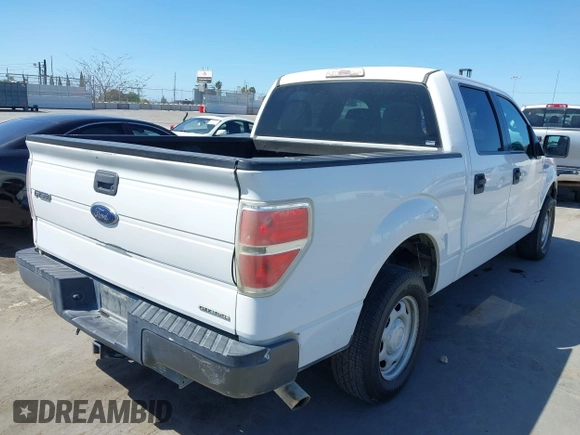 2014 Ford F-150 XL with VIN 1FTEW1CM7EKE10315, listed as a IAAI auction lot 41834859 with 238,500 mi miles and . Bid and sale history available at DreamBid. Image 4.