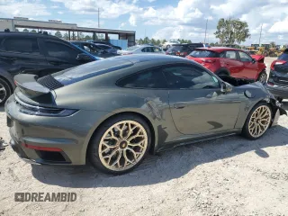 2023 Porsche 911 Turbo with VIN WP0AD2A99PS258016, listed as a Copart auction lot 72852814 with 7,386 mi miles and Salvage Title. Bid and sale history available at carsss.com. Image 3.