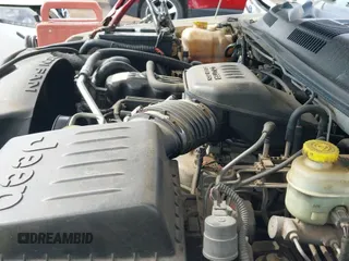 2002 Jeep Grand Cherokee Laredo with VIN 1J4GX48S62C233755, listed as a IAAI auction lot 43213208 with 188,213 mi miles and . Bid and sale history available at DreamBid. Image 21.