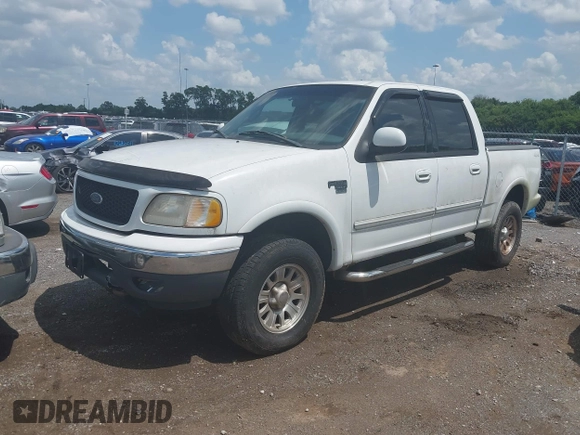 2001 Ford F-150 XLT with VIN 1FTRW08L81KD86516, listed as a IAAI auction lot 42689615 with 320,437 mi miles and . Bid and sale history available at DreamBid. Image 2.