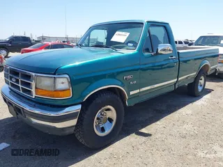 1996 Ford F-150 Special with VIN 1FTEF15N2TLA07520, listed as a IAAI auction lot 42005555 with 184,260 mi miles. Bid and sale history available at carsss.com. Image 2.