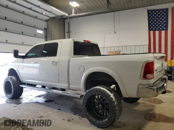 2013 Ram 2500 Laramie with VIN 3C6UR5NL0DG514687, listed as a Copart auction lot 84021994 with 208,964 mi miles and Salvage Title. Bid and sale history available at carsss.com. Image 2.