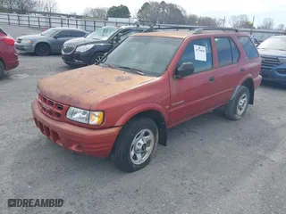 2001 Isuzu Rodeo S with VIN 4S2DM58W514315077, listed as a IAAI auction lot 41784050 with 149,737 mi miles. Bid and sale history available at carsss.com. Image 2.