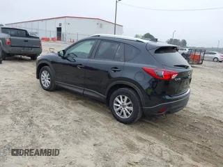 2014 Mazda CX-5 Touring with VIN JM3KE2CY7E0341658, listed as a IAAI auction lot 41915807 with 99,287 mi miles. Bid and sale history available at carsss.com. Image 3.